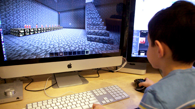 kid playing computer